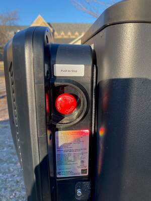 Image of emergency stop button on EV charger